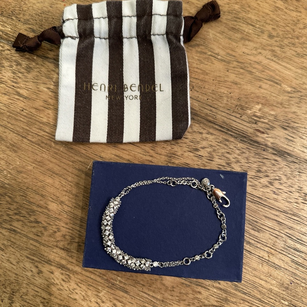 Gorgeous HENRI BENDEL Sparkly Rhinestone, Silver Infinity Bracelet - Picture 2 of 11